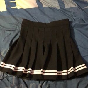Black and white pleated tennis skirt